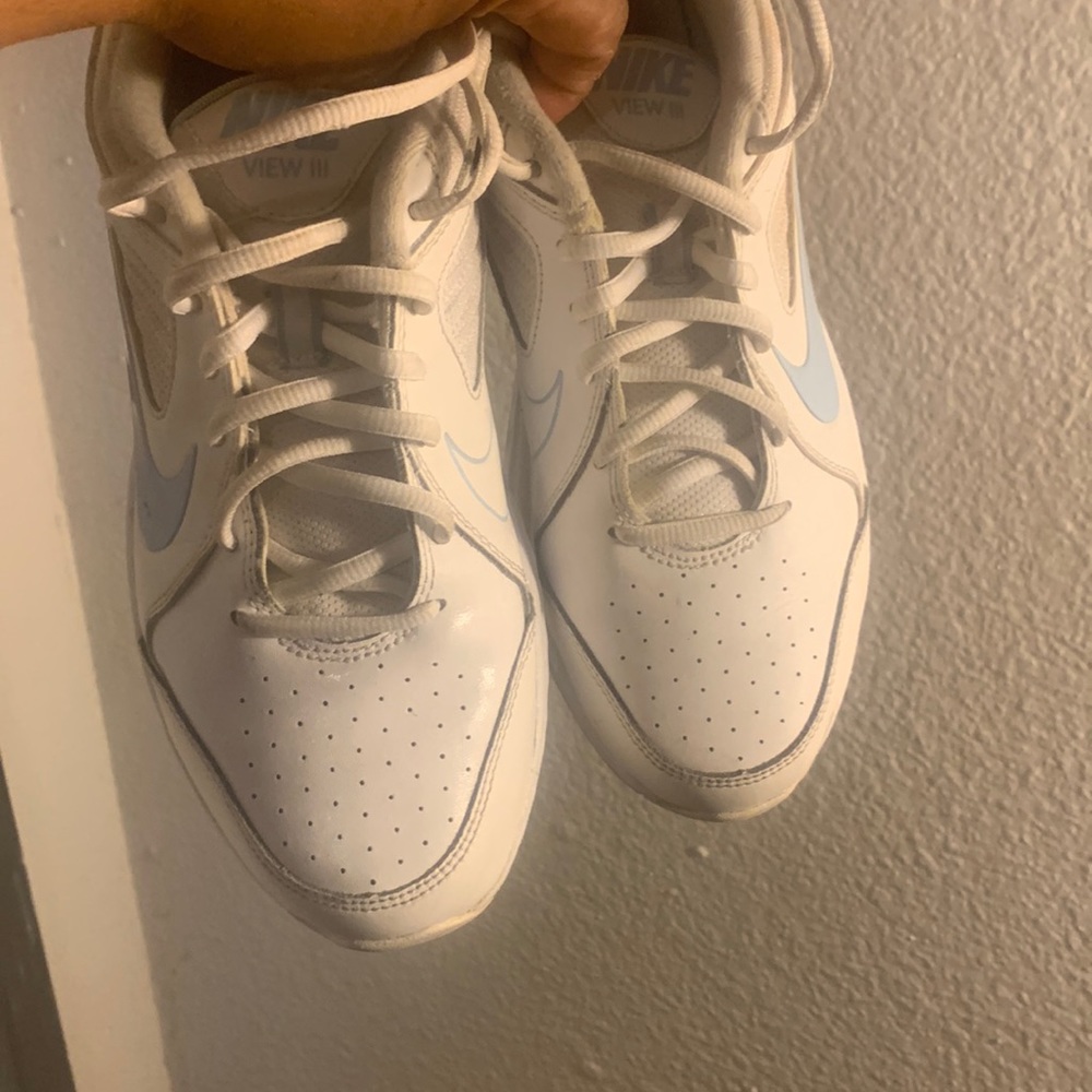 White and baby blue Woman’s Nike shoes size 9